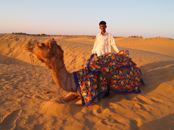 our guide and our camel ~ taking a rest