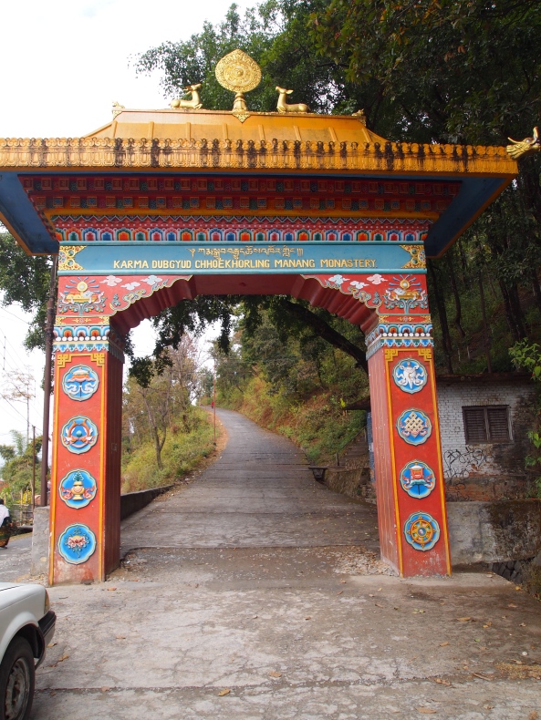 the arch leading to the stairway to the Buddhist Monastery