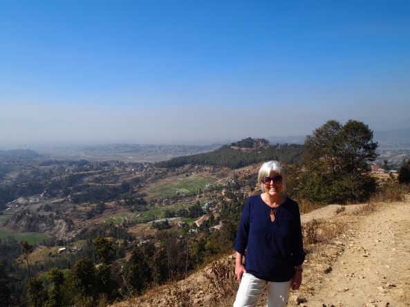 me with my destination, Changu Narayan, on the hilltop behind