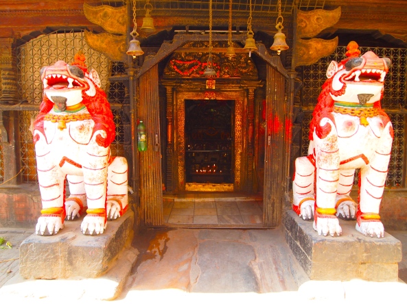 a temple with guard dogs