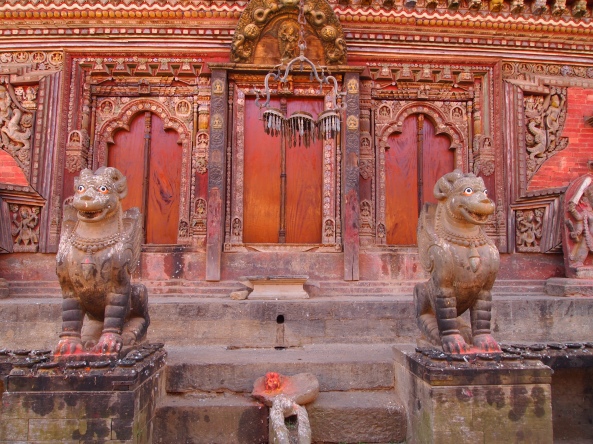 griffins guard the entrances to the temple